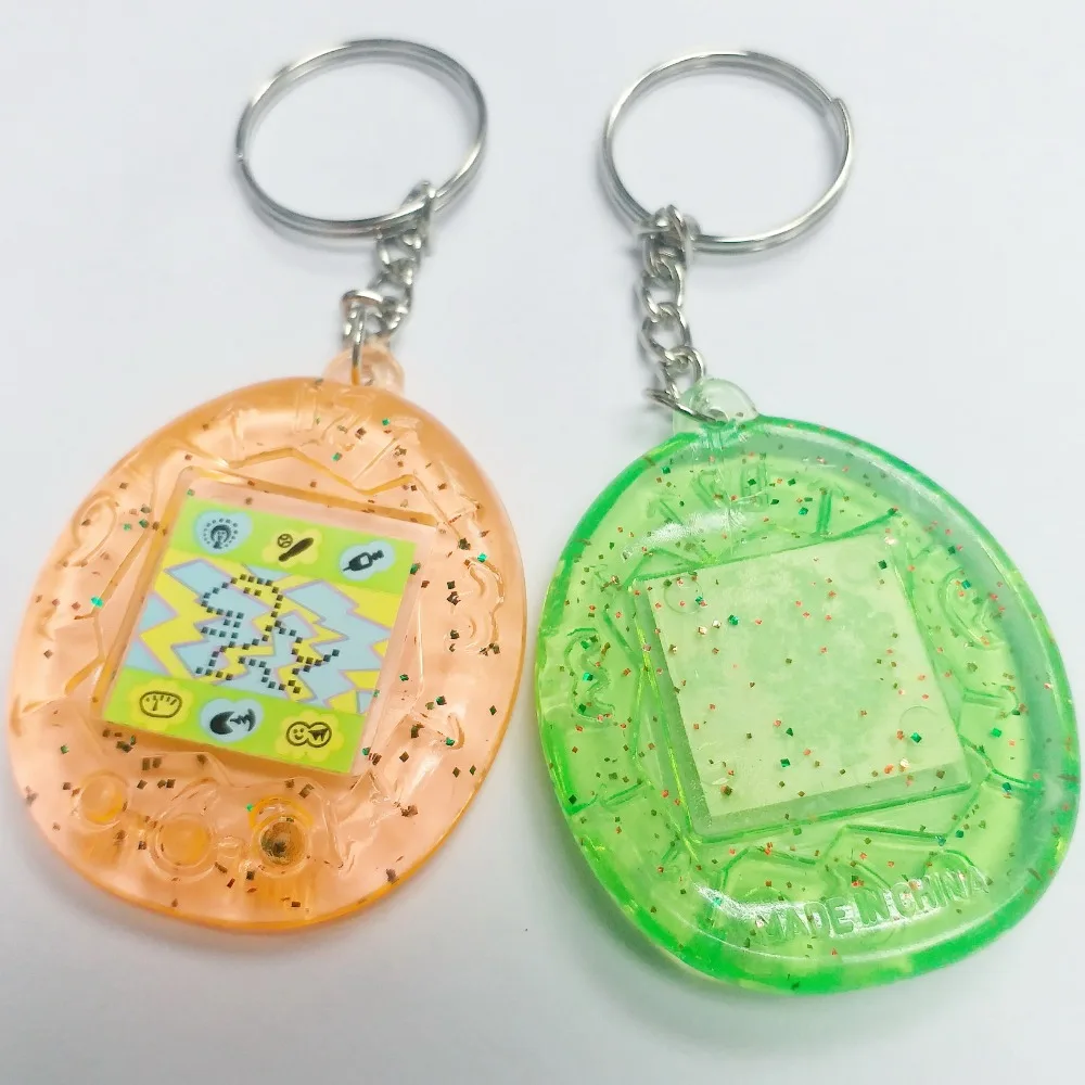 

50 pcs E562-10 TAMAGOTCHI sticker with key chain Rings Retro Birthday Party favors giveaways gadget souvenirs gift Bag Gag Prize
