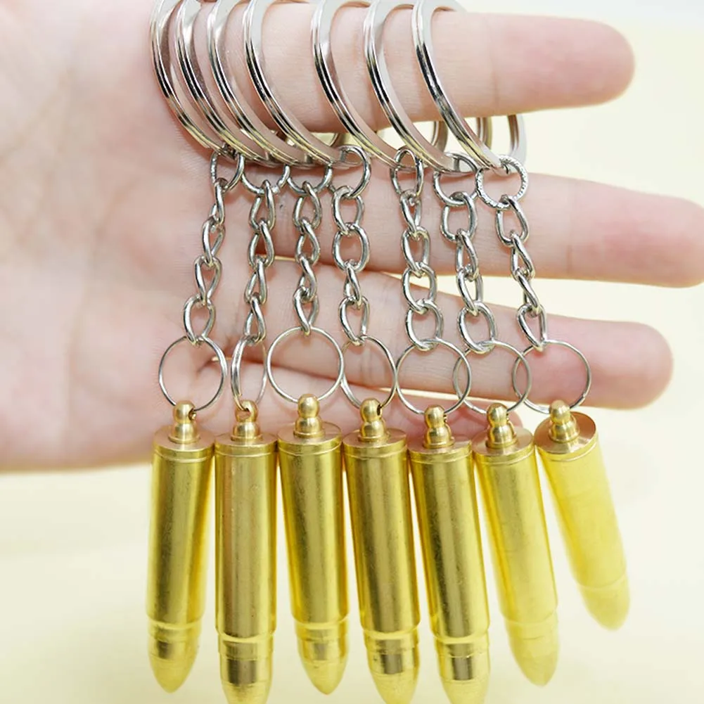 

1Pcs New Portable Bullet Shape Earpick Ear Pick Spoon Keychain Couple Lovers Keyring Unisex