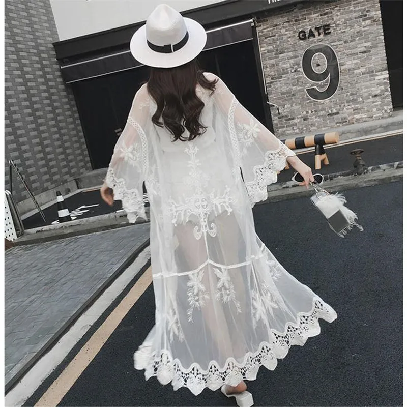 

Transparent Sexy Summer White Lace Women Windbreaker Elegant Floral Crochet Long Female Coat Loose Sunscreen Trench Coat CM2102