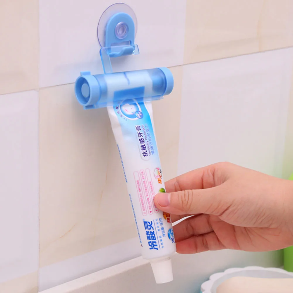 

1 pc Plastic Rolling Tube Squeezer Useful Toothpaste Easy Dispenser Bathroom Holder Free Shipping Color Random