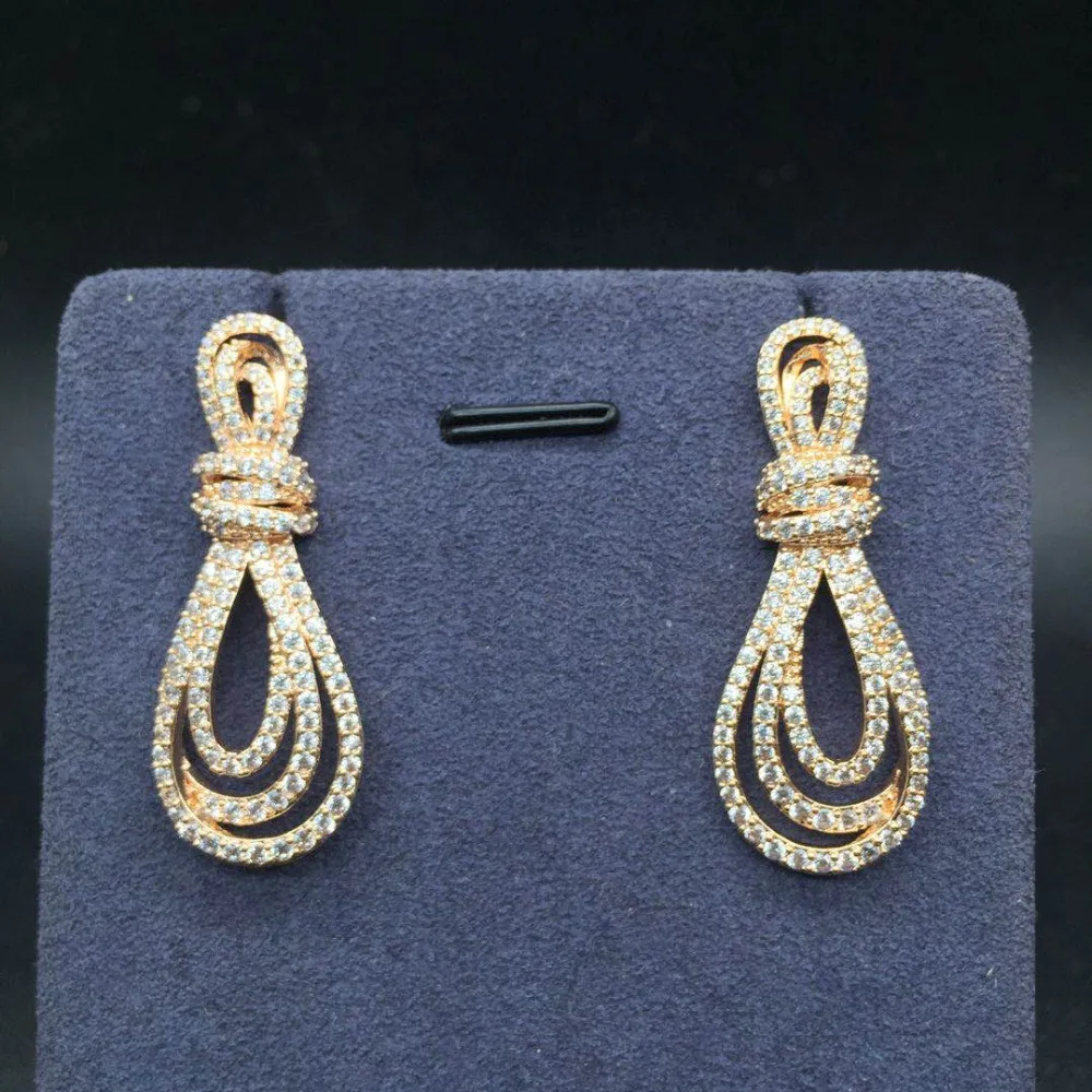 

Luxury AAA Cubic Zirconia Tie Kot Layered Unique Design Drop Earrings For Women Usa Saudi Dubai Style Autumn Accessories