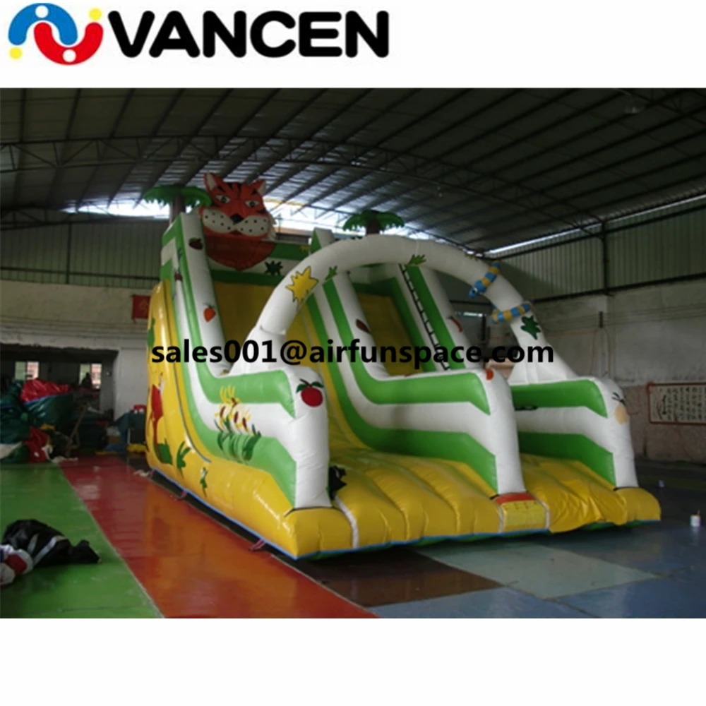 

Hot selling 3.5*6m inflatable tiger slide with arch forest inflatable bouncer with slide for kids and adult