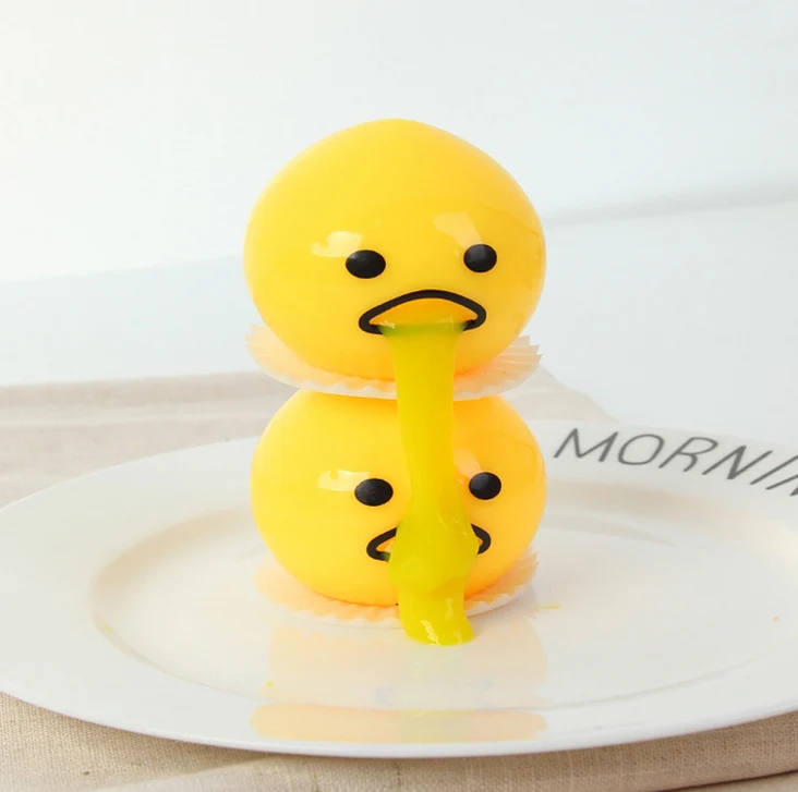 squishy puking egg yolk stress ball