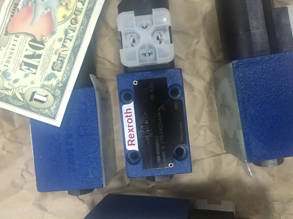 

4WE6Y70/HG24N9K4 NEW REXROTH VALVE 4WE6Y7X/HG24N9K4