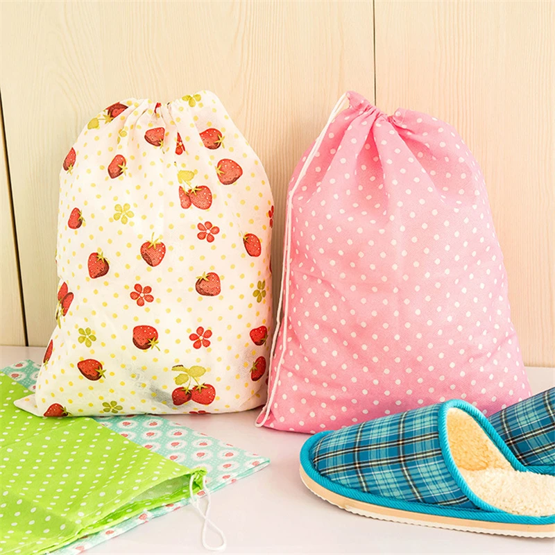 

2012 Portable drawstring beam mouth printed nonwoven cloth dustproof shoe bag for fashion Travel Storage Bags