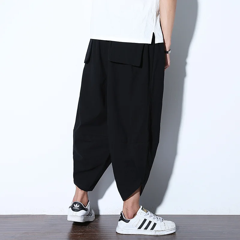 

PADEGAO mens boho linen harem pants Mid Waist Loose cross pants street calf length linen harem pants japan Harajuku hippie pants
