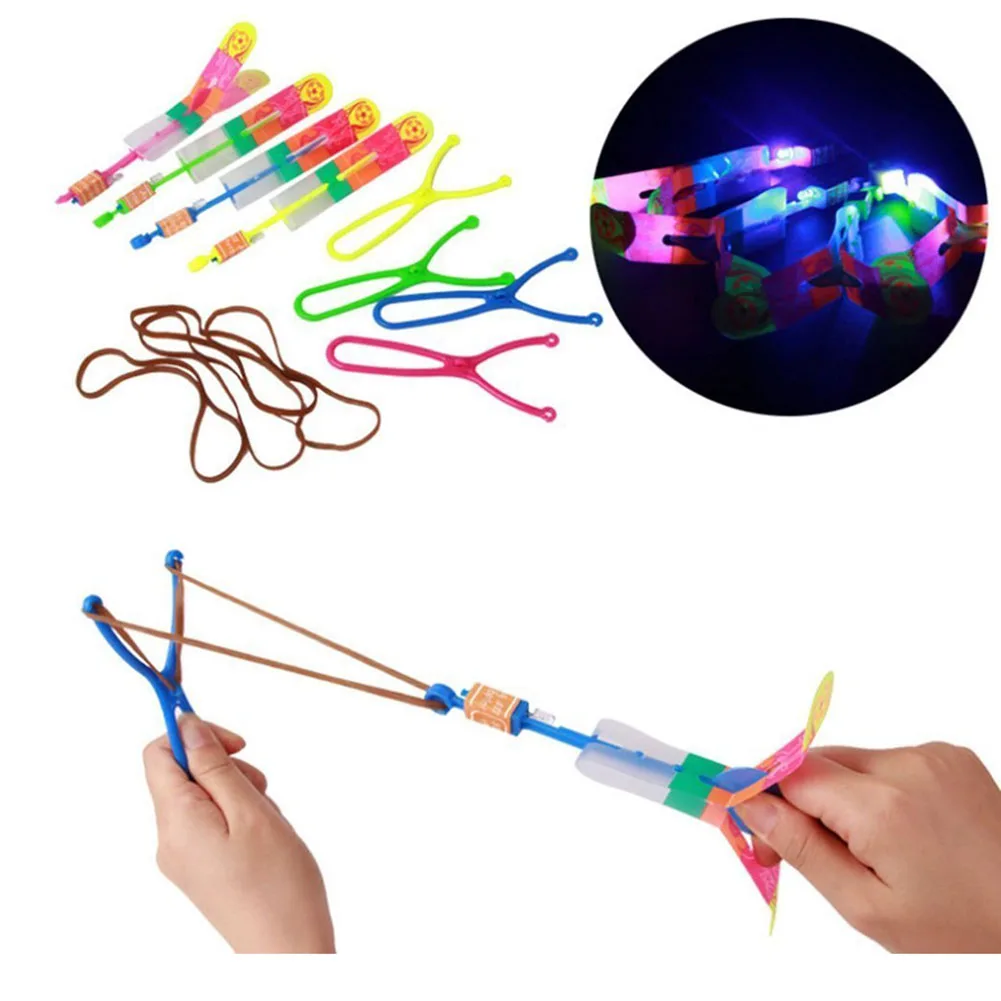 LED Light Slingshot Elastic Arrow Rocket Helicopter Flying Toy Party Fun Gift