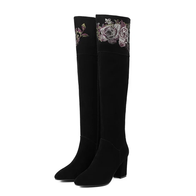 cow print knee high boots