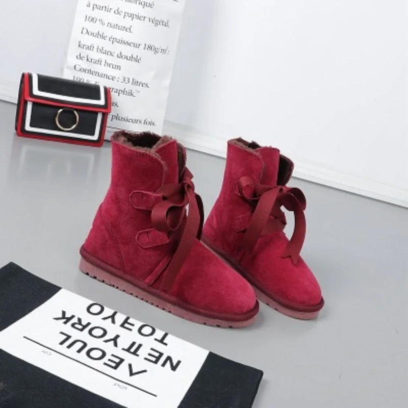 

2018 winter new snow boots female leather student with tube cotton shoes plus velvet warm and comfortable trend boots