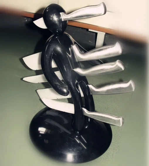

Novelty Kitchen Gifts Blocks Roll Rack Shelf Stand Creative Humanoid Stainless Steel Magnet Knife Holder With Free Knives