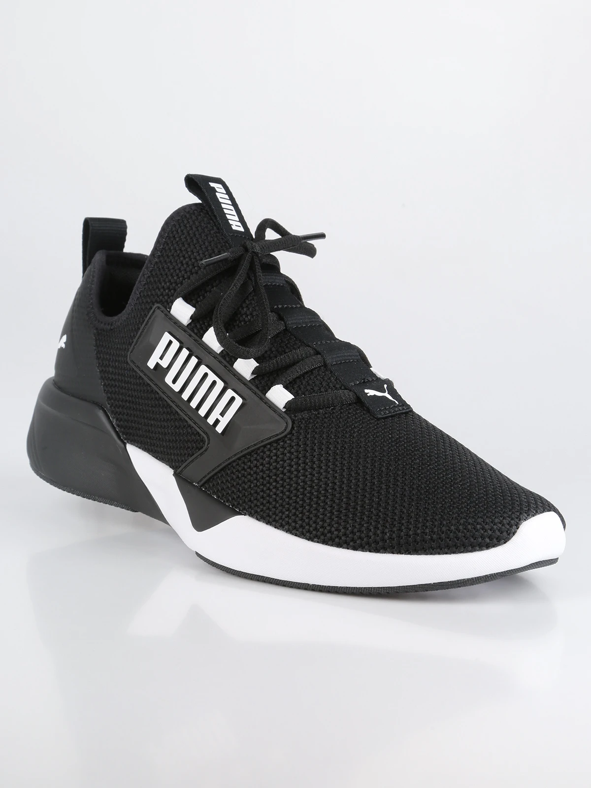 puma training retaliate sneakers in black