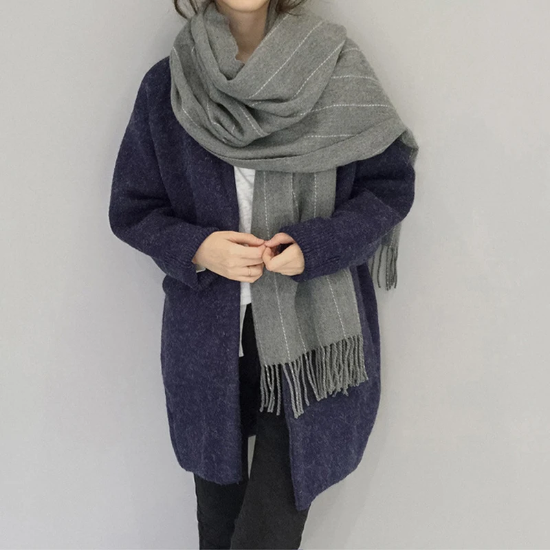 

Mingjiebihuo New winter Korean fashion wool handmade solid color scarf thickening men and women couple knitted tassel scarf