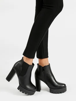 

Half boots with high heel and studs
