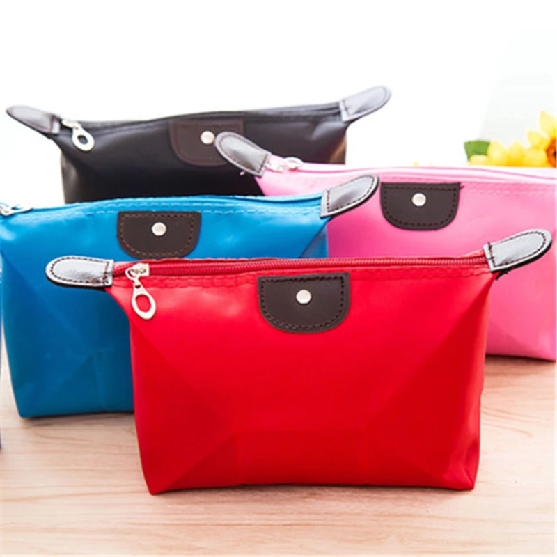 

1158 Korean dumplings water makeup bag simple fashion girls small objects hand bag bag T