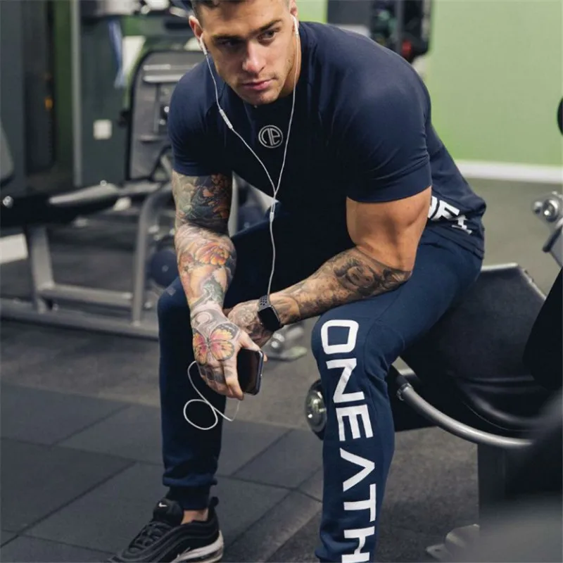 YEMEKE Gyms Men's Sets 2018 Fashion Sportswear Tracksuits Sets Men's T-shirt+Pants casual Suits Chandal Hombre Completo YEMEKE Gyms Men's Sets 2018 Fashion Sportswear Tracksuits Sets Men's T-shirt+Pants casual Suits Chandal Hombre Completo