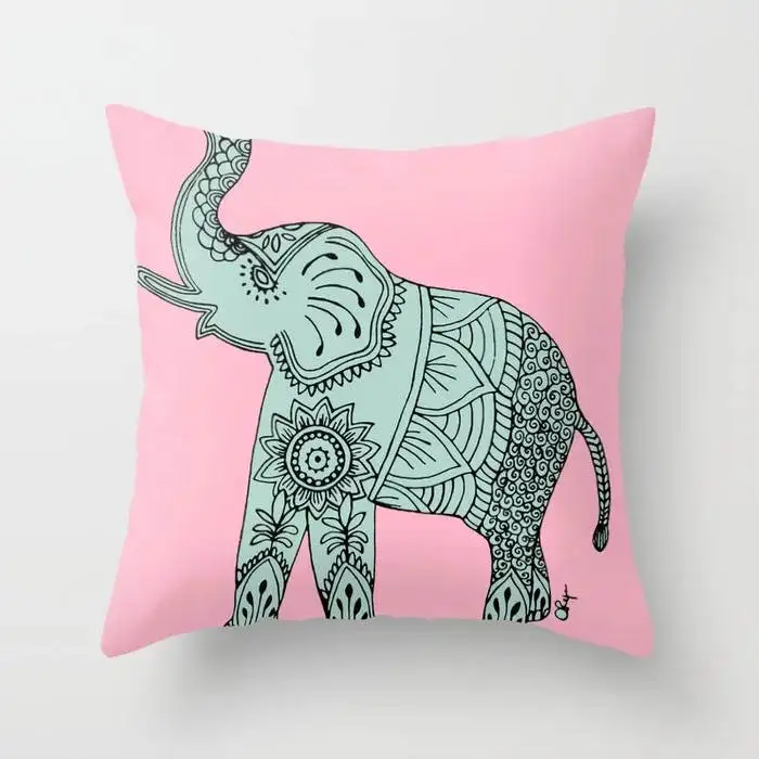elephant-doodle-in-mint-and-pink-pillows.webp
