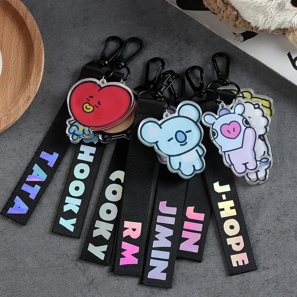 

1PC Fashion pop Laser Lanyard Creative Bags Accessories TATA COOKY SHOOKY Cute BackPack Ribbon Pendant Bangtan Boys Keychai