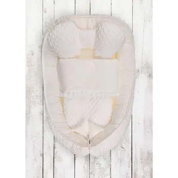 

Multifunctional nest for children or babies. STUFFED COCONUT FIBER. In white COLOR. Includes decorative pillow. CRIB REDUCER