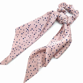 

Blue polka dot hair rubber. An original gift.