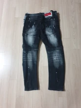 Vaqueros de estilo europeo americano para hombre, pantalones vaqueros con agujeros rotos rasgados, con puntos de laca, ajustados para los pies, a la moda Pantalones, vaqueros de nombre grande internacional