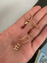 Modyle 5 unids/set moda 2019 puños de oído hoja de oro brazalete de oído pendientes de Clip pendientes largos aretes pendientes para las mujeres los escaladores sin Piercing falso pendiente de cartílago