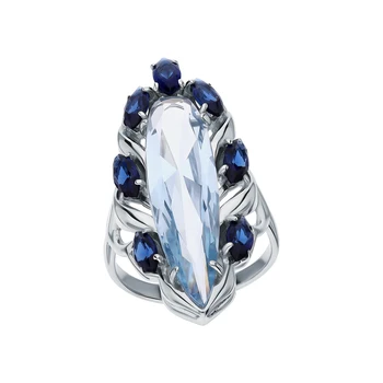 

Silver ring with Topaz imitation and Sapphire synthetic sunlight sample 925