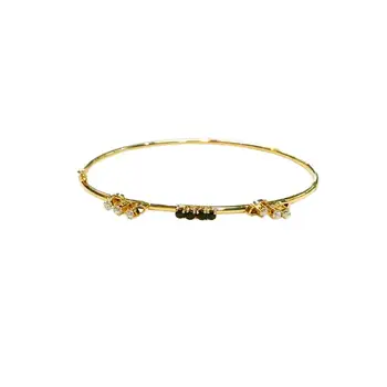 

Gold chain bracelet with Sapphires and Zircons