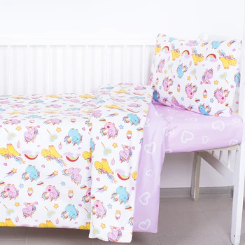 

Bed linen in a cot made of poplin with sheets on an elastic band