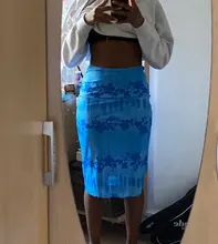 Faldas de estilo informal bohemio para mujer, faldas de cintura alta con estampado Floral, color Naranja, a media pierna, para playa, fiesta y vacaciones