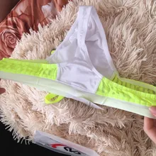 Bañador Sexy para hombre, tangas de cintura baja, traje de baño de secado rápido, malla transpirable, playa, bañador de surf