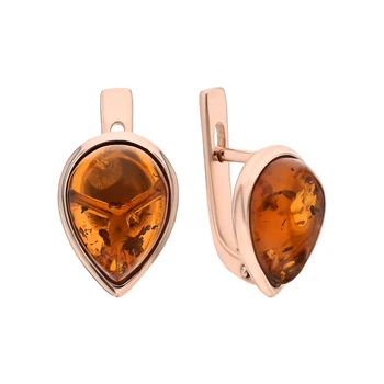 

Silver earrings with amber sunlight