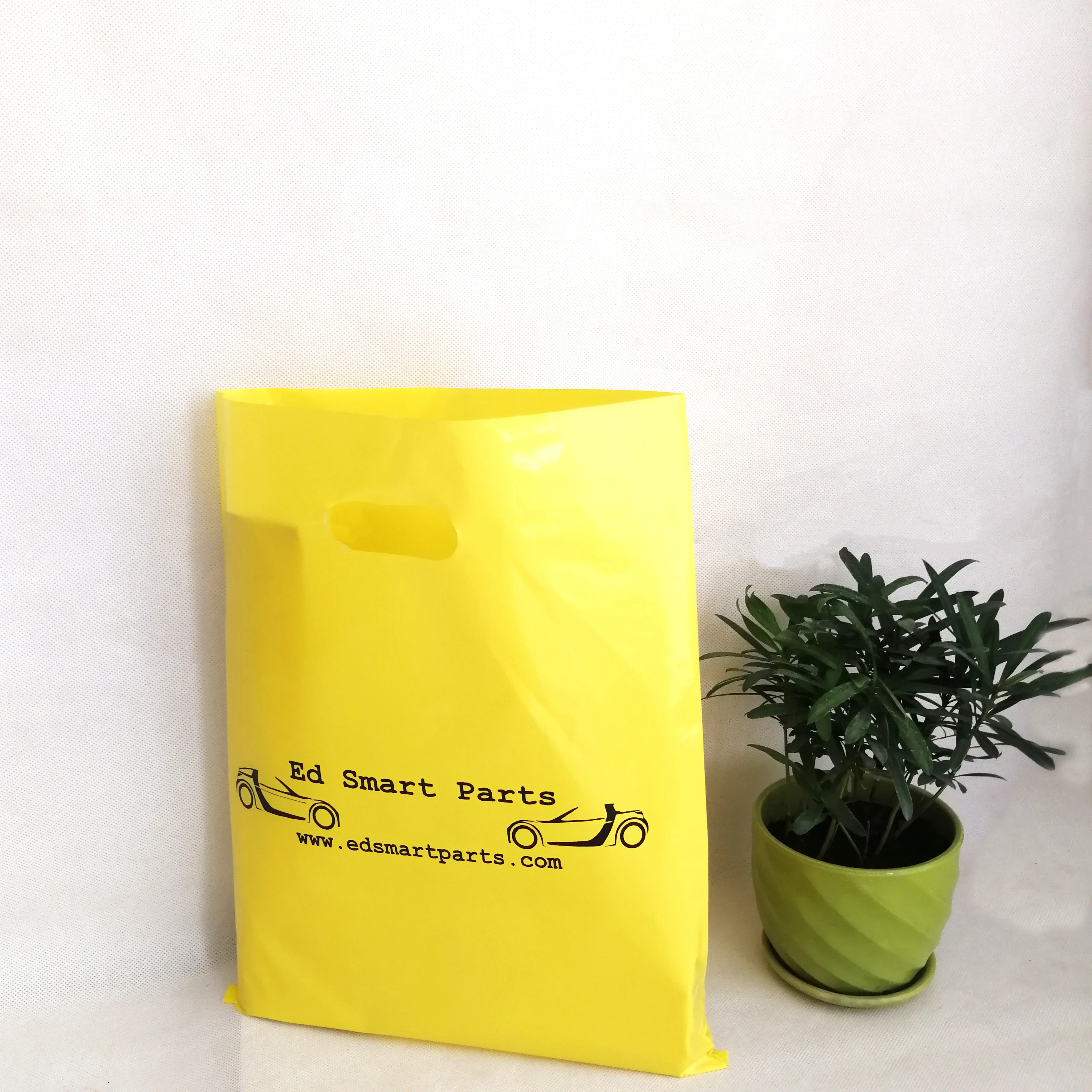 Экономичная высеченная ручка пластиковый мешок с логотипом подарки упаковочные