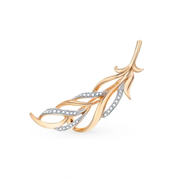 

Gold brooch with diamonds sunlight