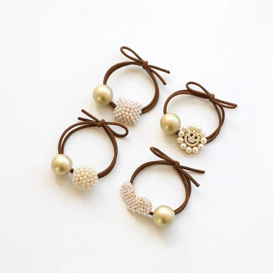 

Korean Cute Pearl Smiling Face Girls Hair Rope Simple Rubber Band With Golden Ball Headdress Woman Hair Accessories