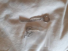 Ídolo KPOP ADN chicos coreanos PERNO DE ACERO INOXIDABLE pendientes de la pluma de cadena larga de las mujeres de los hombres de Rock Grunge Hipster Punk Unisex Clip de oreja