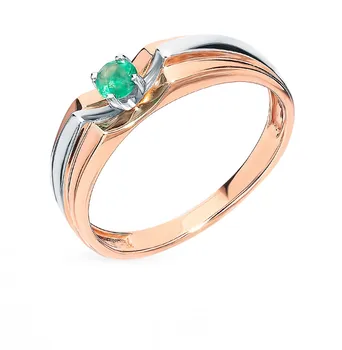 

Gold ring with emeralds sunlight