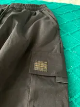 Pantalones Cargo de harén con bolsillos laterales para hombre, pantalón negro de Hip-Hop, informal, a la moda, ropa de calle, 2020 cintas