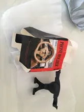 Soporte de teléfono para coche, rejilla de ventilación de gravedad, soporte para teléfono móvil, salida de aire, cuna automática para teléfono móvil Universal