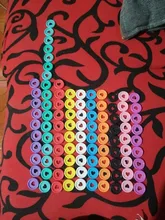 100 Uds 24mm portátil de plástico anillo de carpeta hebilla de 360 grados de rotación de agujero color aprendizaje suministros de encuadernación