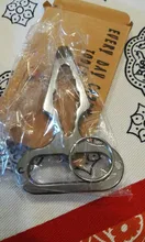 Herramienta de protección Personal multifuncional para exteriores, abrebotellas de acero inoxidable, llave de combinación