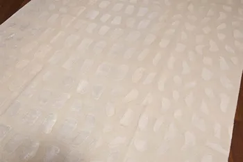 

EMOTION 66 WHITE HANDMADE RUG