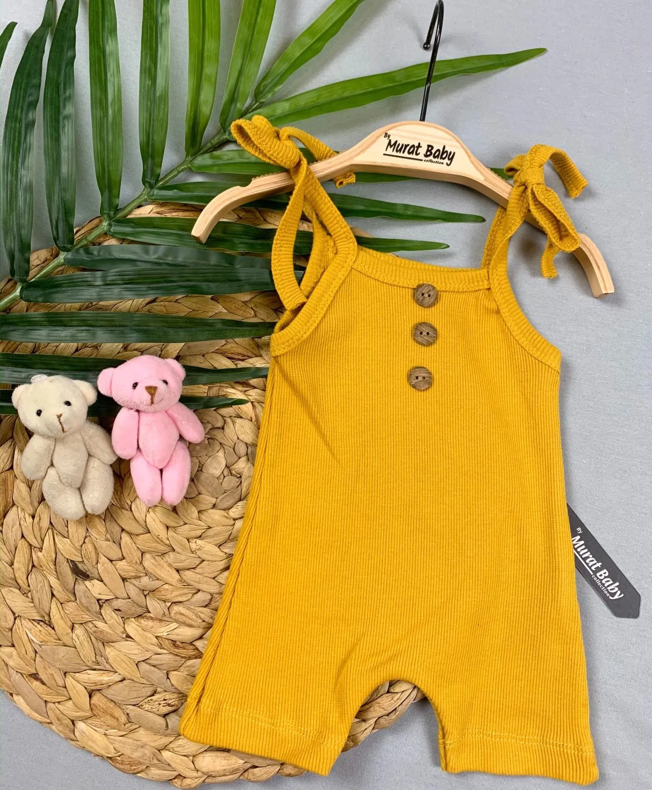 

HANGING BUTTONED BABY JUMPSUIT BABY CLOTHING