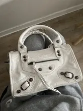 Bolso europeo de cuero PU para motocicleta para mujer, bandoleras cruzadas con remaches y borlas