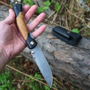 

Knife folding Kairos with a blade of Damascus steel