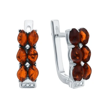 

Silver earrings with amber sunlight