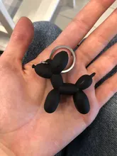 Nuevo creativo de dibujos animados globo de Llavero perro colgante anillo de hombres y mujeres par bolsa de llavero colgante venta al por mayor