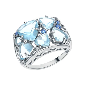 

Silver ring with cubic zirconia and Topaz imitation sunlight sample 925