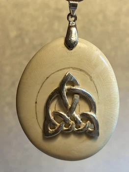 

Shock Mount Triskele with silver of бивня Mammoth