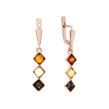 

Silver earrings with amber sunlight