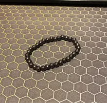 Pulsera de Metal elástica para hombre y mujer, brazalete redondo de piedra natural negra para la pérdida de peso, terapia magnética, hematita, moda